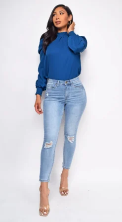 Making Moves Light Wash Blue Knee Ripped Jeans